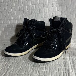 Nike Force Sky High women's hidden wedge sneaker in black and anthracite.